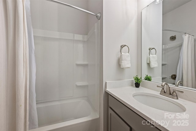 bathroom featuring vanity and shower / tub combo