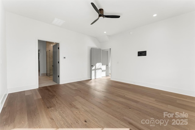 interior space featuring ensuite bath and light wood-type flooring