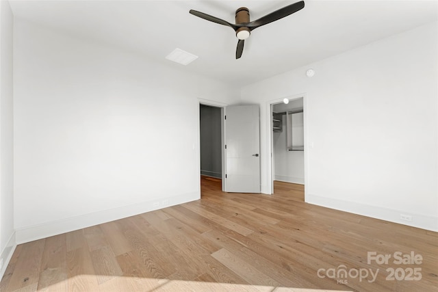 unfurnished bedroom featuring ceiling fan and light hardwood / wood-style floors