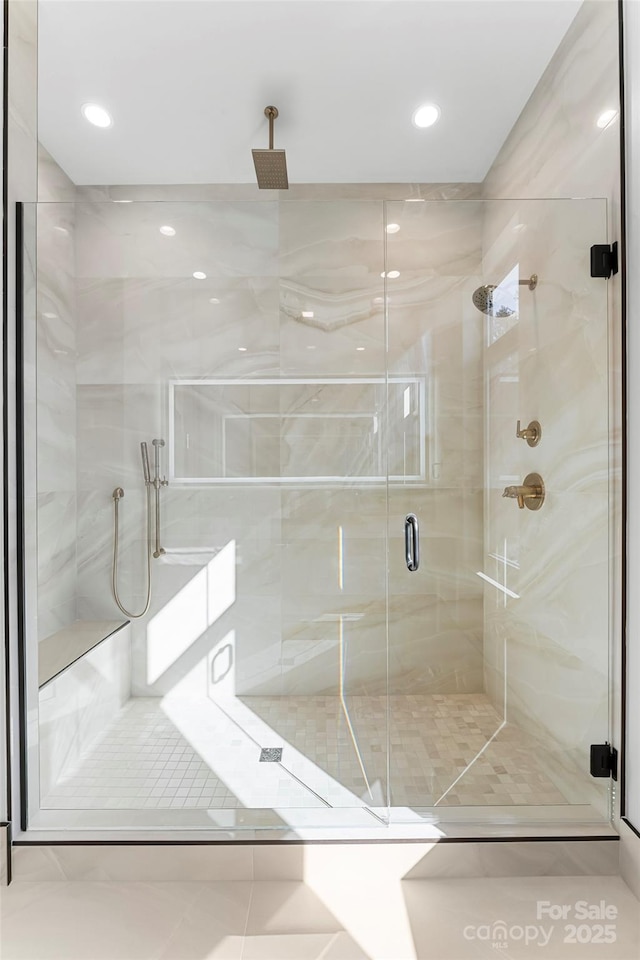 bathroom with an enclosed shower