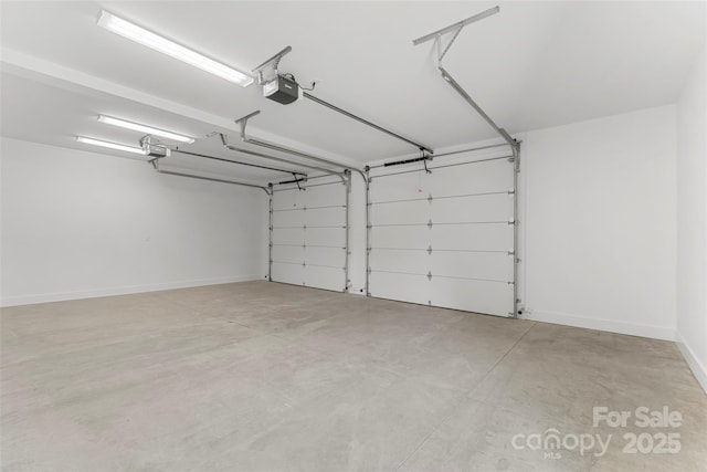 garage featuring a garage door opener