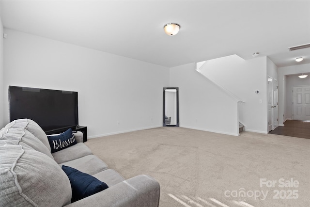 living area featuring light carpet, stairway, baseboards, and visible vents