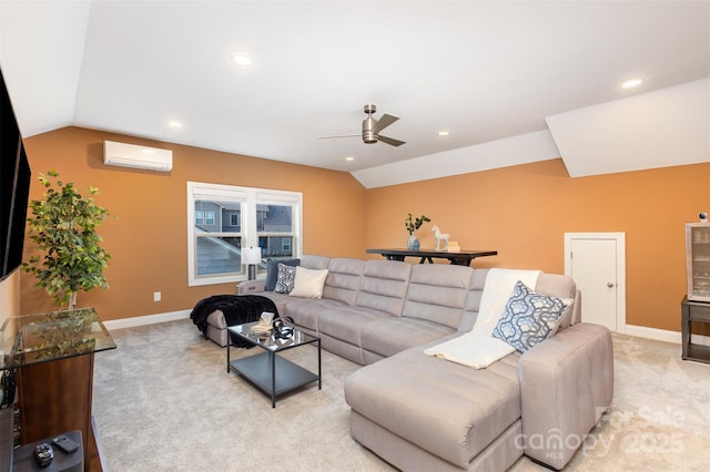 living room with an AC wall unit, light colored carpet, vaulted ceiling, and baseboards