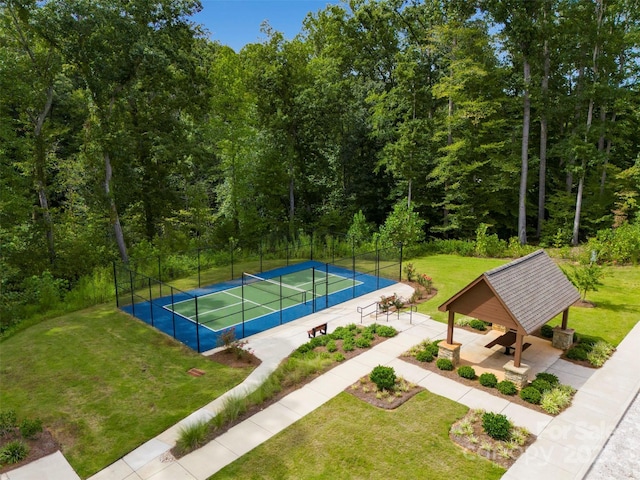 view of pool featuring a yard, a tennis court, a gazebo, and fence