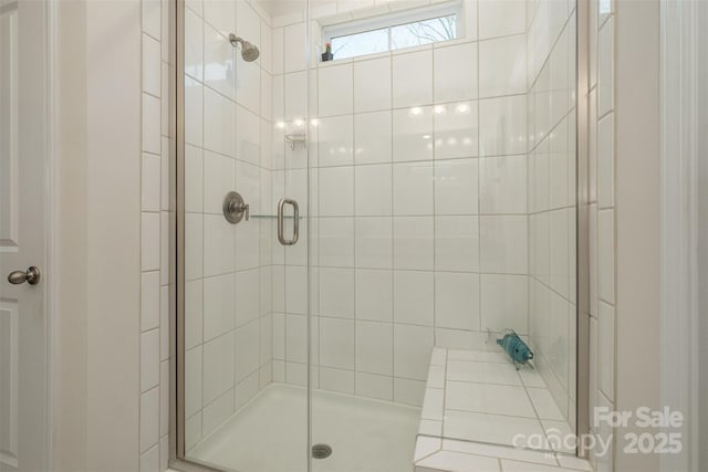 bathroom featuring a stall shower