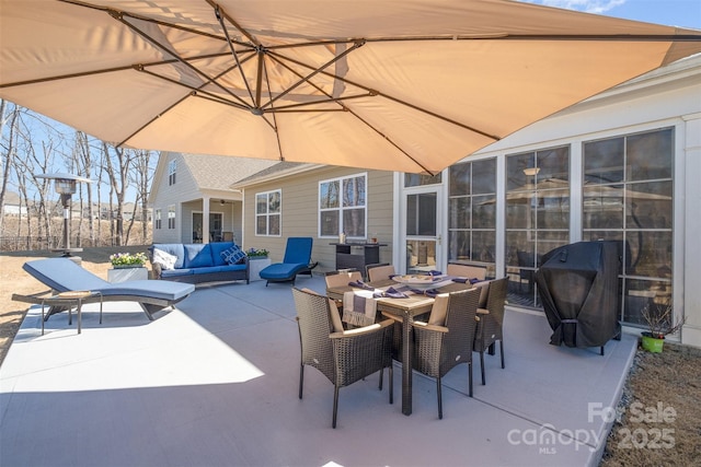 view of patio / terrace with outdoor dining area, outdoor lounge area, and grilling area