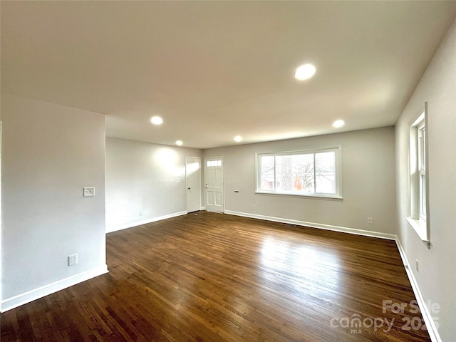 empty room featuring dark hardwood / wood-style floors