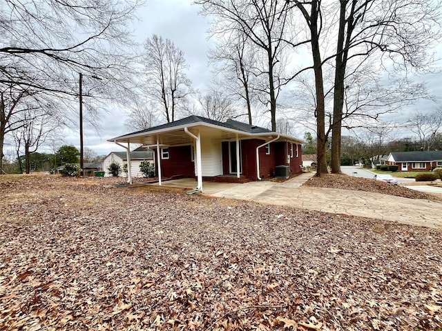 view of property exterior featuring central AC