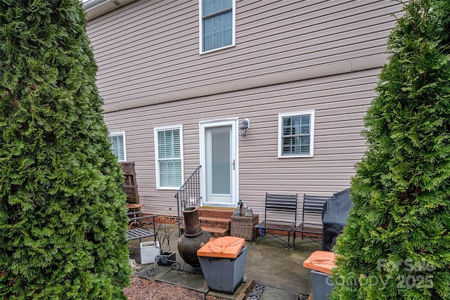 back of house with a patio area