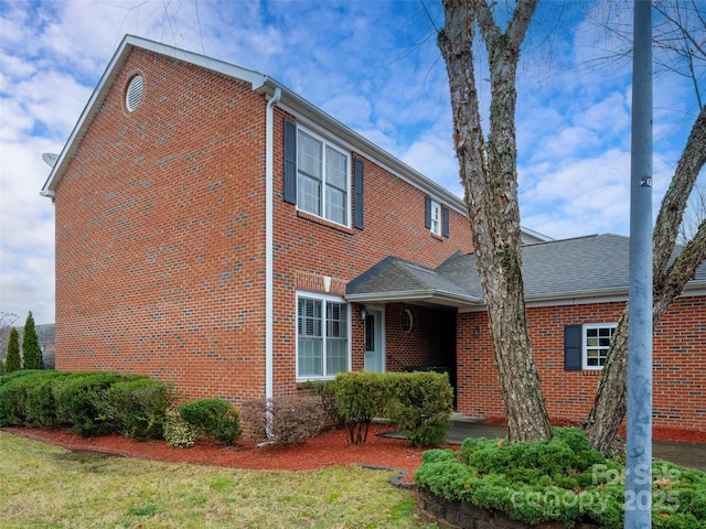 view of front of home with a front yard