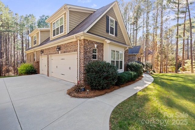 view of home's exterior with a yard and a garage