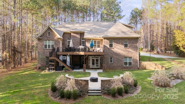 view of front of property featuring a deck, a front lawn, and a patio area