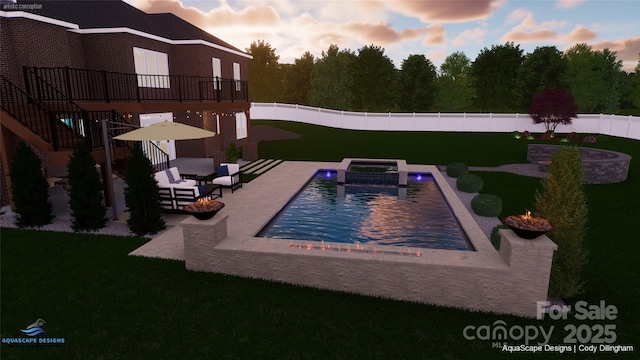 pool at dusk with a patio area, a yard, and an in ground hot tub