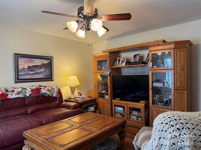 living room with hardwood / wood-style flooring and ceiling fan