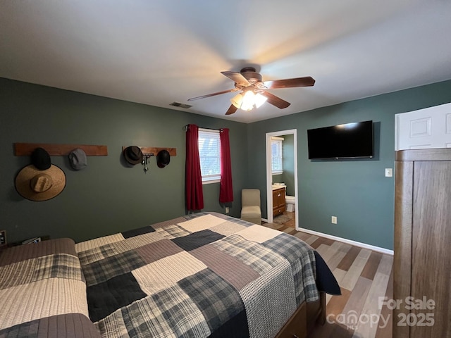 bedroom with hardwood / wood-style flooring and ceiling fan