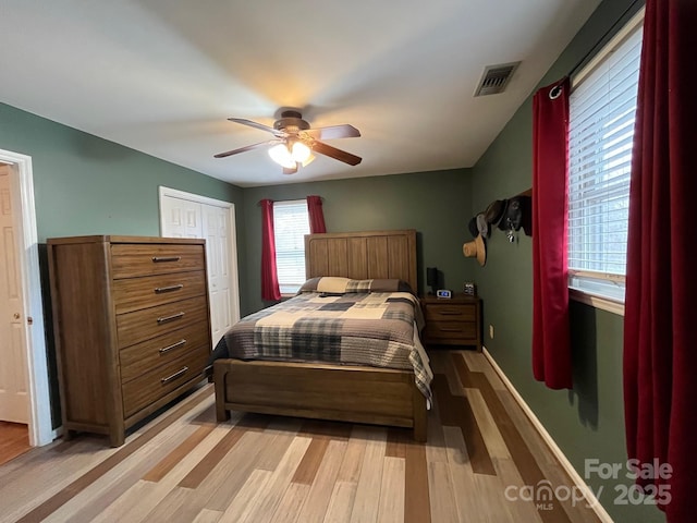 bedroom featuring ceiling fan and light wood-type flooring