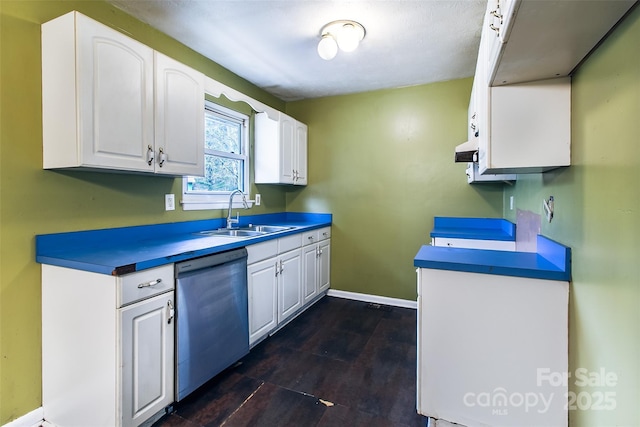 kitchen featuring white cabinets, exhaust hood, dishwasher, and sink