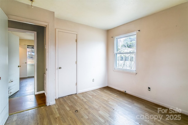 unfurnished bedroom with light hardwood / wood-style floors