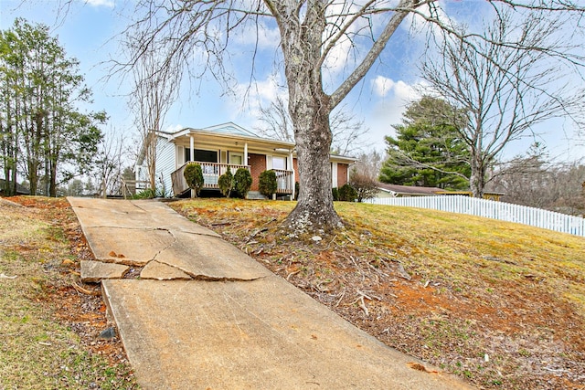 single story home featuring a porch