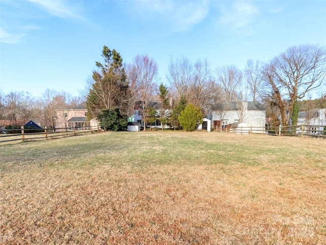 view of yard with fence