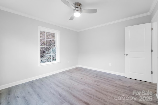 unfurnished room with crown molding, ceiling fan, and light hardwood / wood-style floors