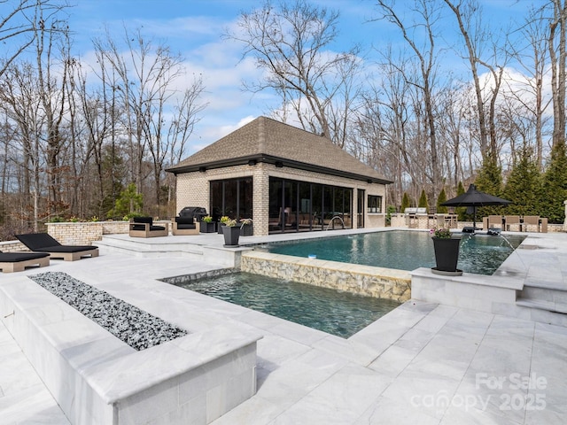 outdoor pool featuring an outbuilding, a patio, a storage structure, outdoor lounge area, and a grill