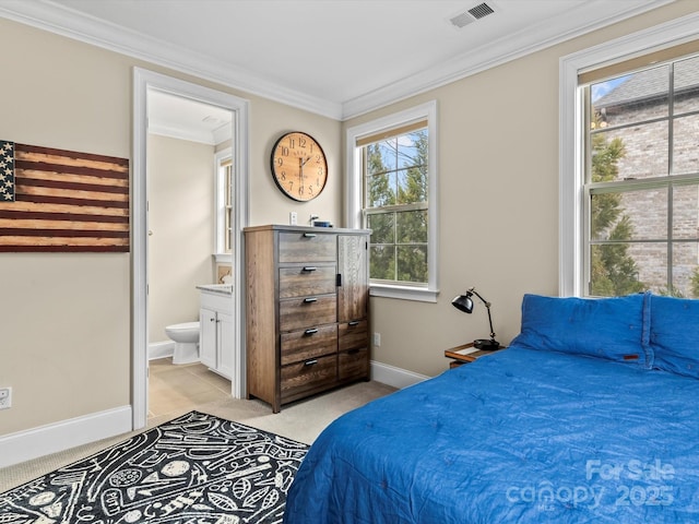 bedroom featuring visible vents, connected bathroom, baseboards, ornamental molding, and light carpet