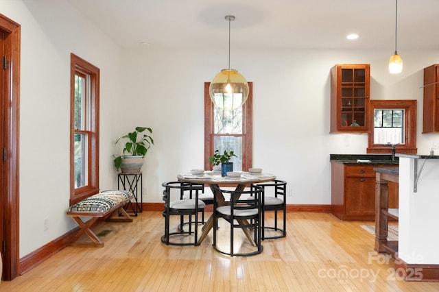 dining space featuring light hardwood / wood-style floors