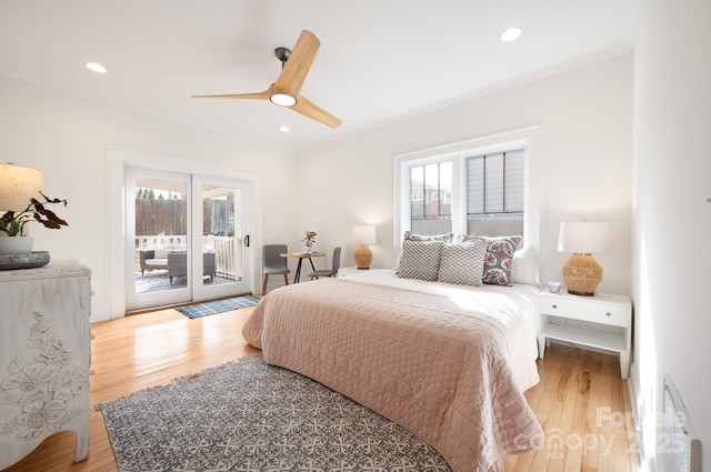 bedroom featuring hardwood / wood-style flooring, crown molding, access to exterior, and ceiling fan