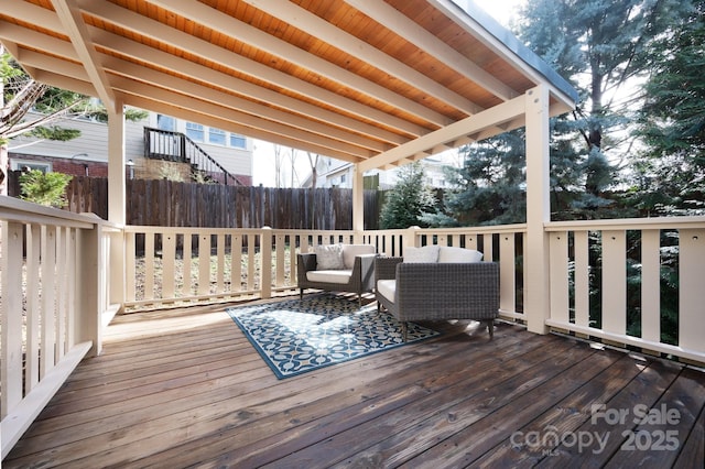 deck featuring outdoor lounge area