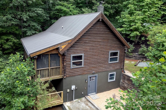 3925 Blackberry Crest Ln, Lenoir, NC 28645 - rear view of property with a chimney and metal roof