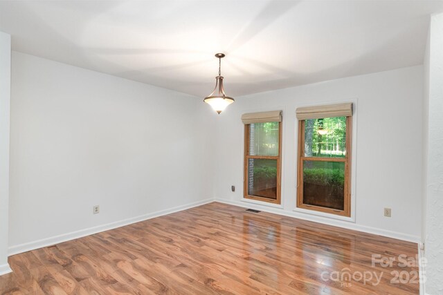 1006 Lost Cv, Weddington, NC 28104 - unfurnished room with wood finished floors and baseboards
