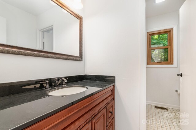 1006 Lost Cv, Weddington, NC 28104 - bathroom featuring vanity and tile patterned floors