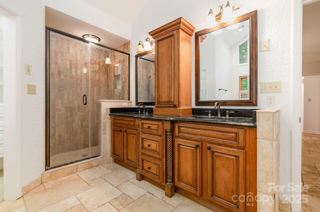 1006 Lost Cv, Weddington, NC 28104 - full bath with double vanity and a stall shower