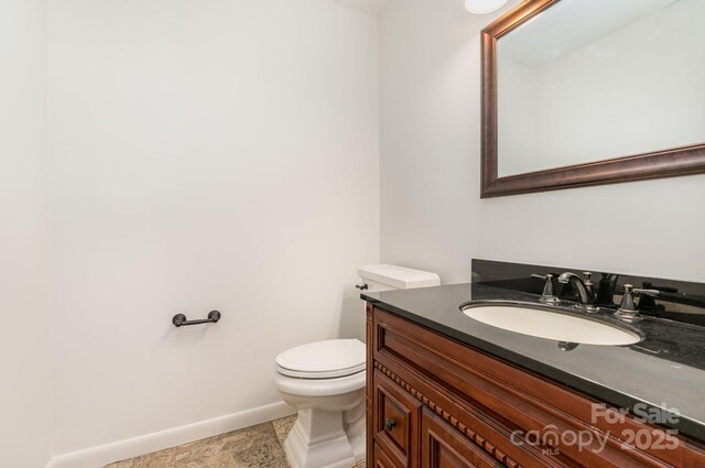 1006 Lost Cv, Weddington, NC 28104 - half bathroom featuring baseboards and vanity