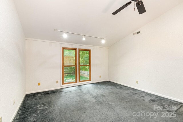 1006 Lost Cv, Weddington, NC 28104 - empty room featuring rail lighting, carpet, and a ceiling fan