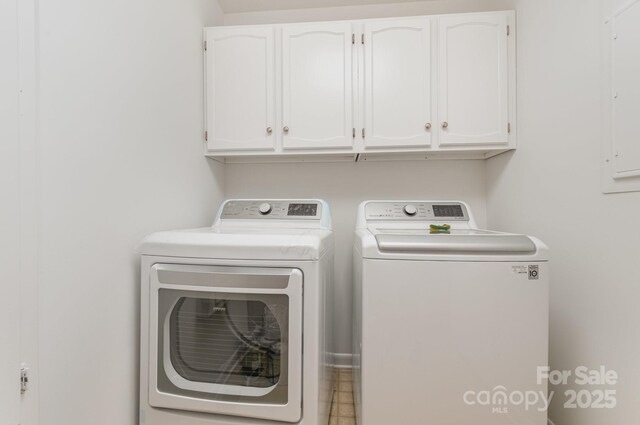 1006 Lost Cv, Weddington, NC 28104 - laundry room featuring cabinet space and independent washer and dryer