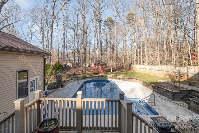 1006 Lost Cv, Weddington, NC 28104 - view of swimming pool with a fenced backyard and a patio