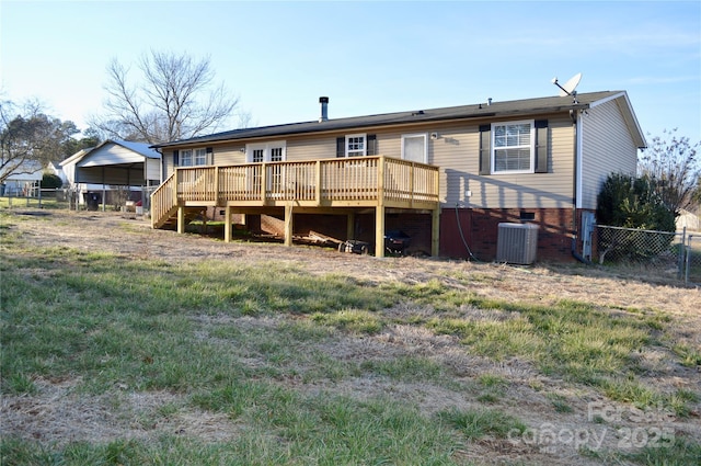 back of property featuring a deck and central air condition unit