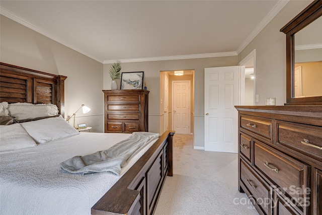 carpeted bedroom featuring crown molding