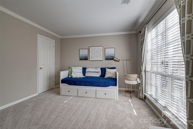 bedroom with light carpet and crown molding