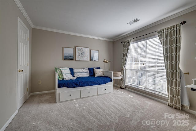 carpeted bedroom with crown molding