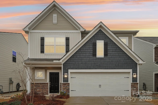 craftsman house with a garage