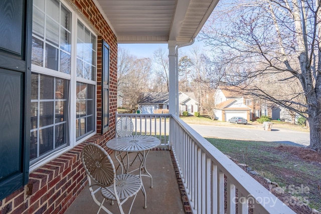 balcony featuring covered porch