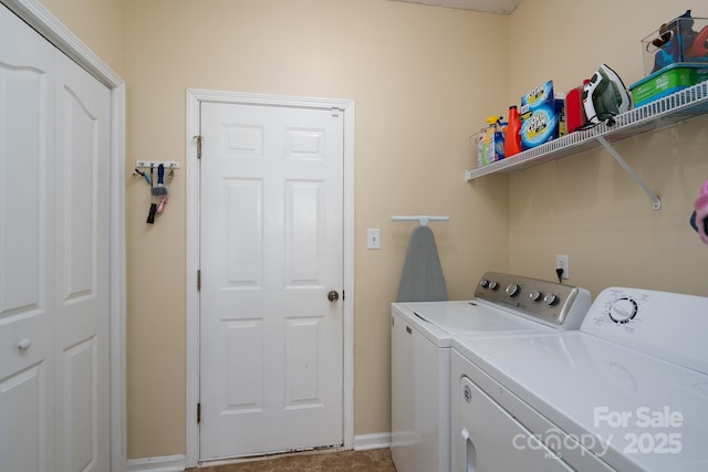 washroom with separate washer and dryer