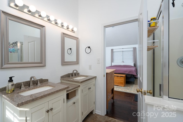 bathroom featuring vanity and hardwood / wood-style floors