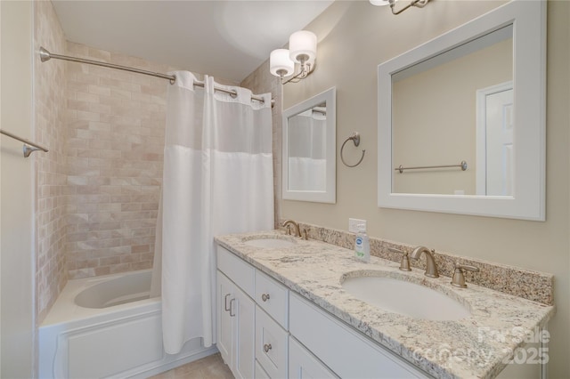 bathroom with tile patterned flooring, vanity, and shower / tub combo