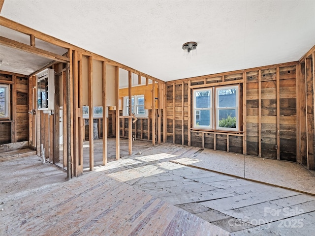 misc room with a textured ceiling