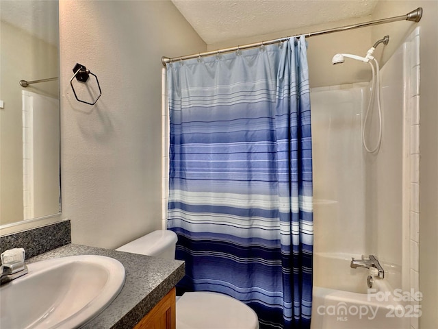 bathroom featuring a textured wall, toilet, shower / tub combo with curtain, a textured ceiling, and vanity