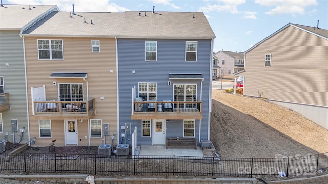 back of property featuring cooling unit, a patio, and fence